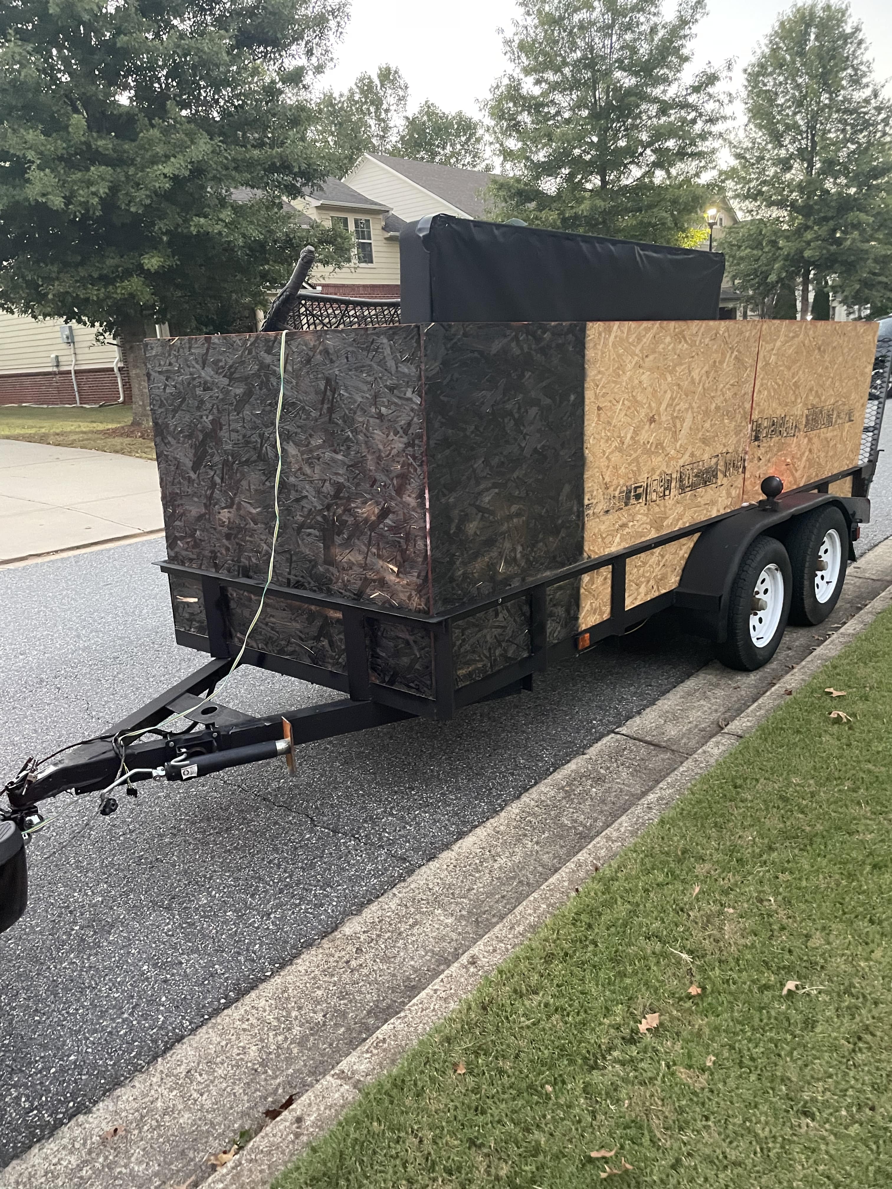 Professional junk removal service in Marietta GA with loaded truck full of furniture and debris